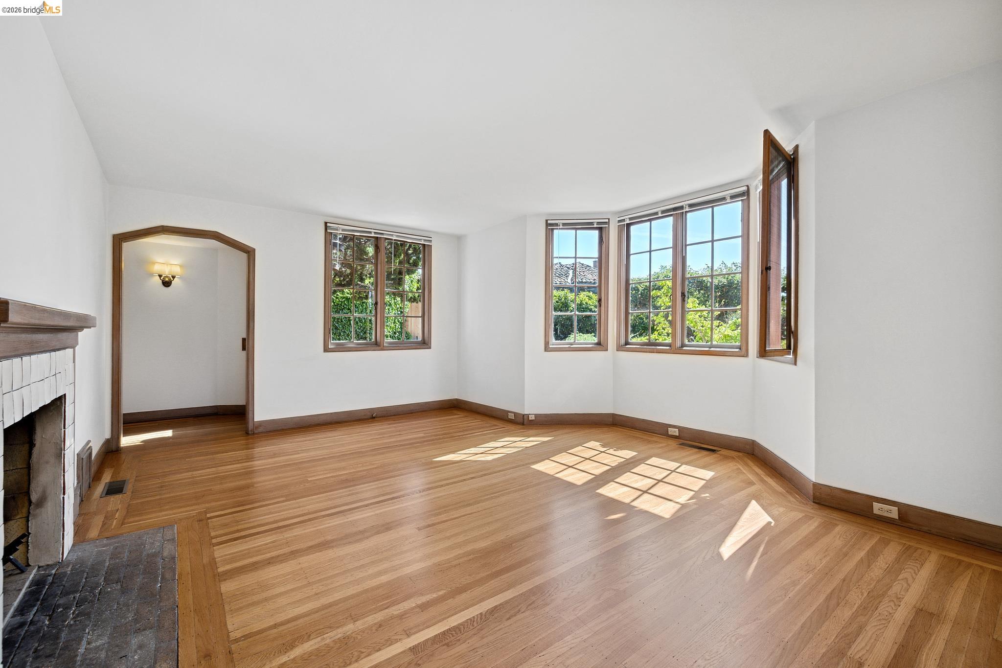 2501 Rose Walk Berkeley, CA 94708 - Photo 38 of 60 a view of an empty room with window and wooden floor