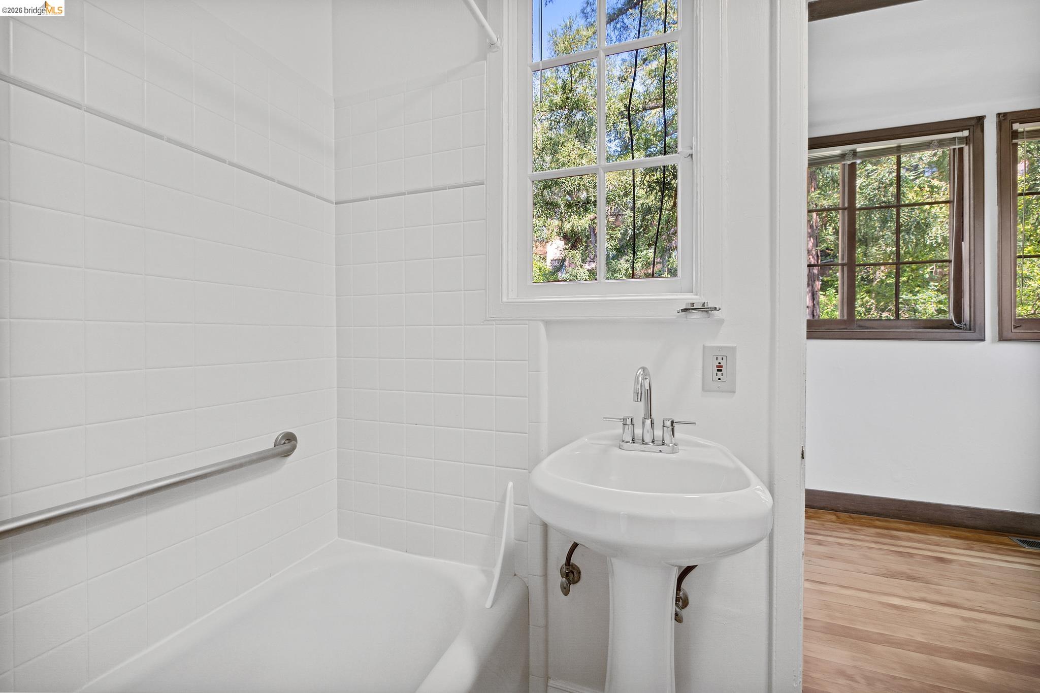 2501 Rose Walk Berkeley, CA 94708 - Photo 47 of 60 a bathroom with a sink a mirror and a bathtub