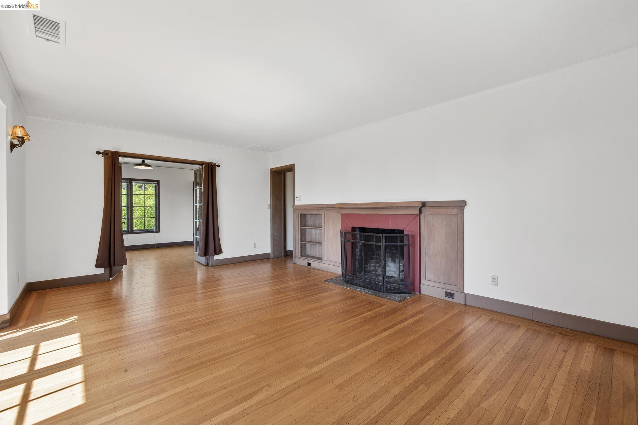 2501 Rose Walk Berkeley, CA 94708 - Photo 48 of 60 a view of an empty room with window and fire place