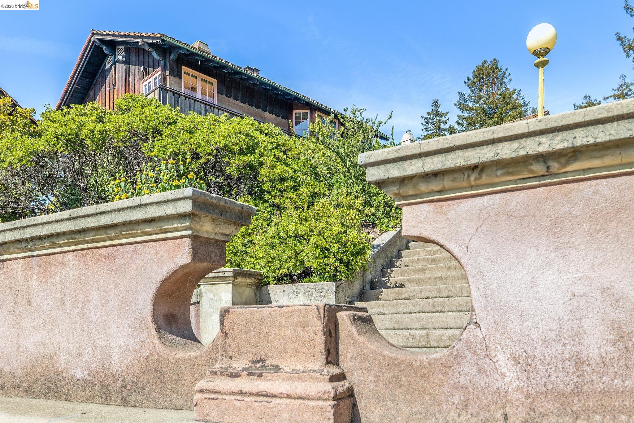 2501 Rose Walk Berkeley, CA 94708 - Photo 5 of 60 a vase of flowers sitting on a table with window