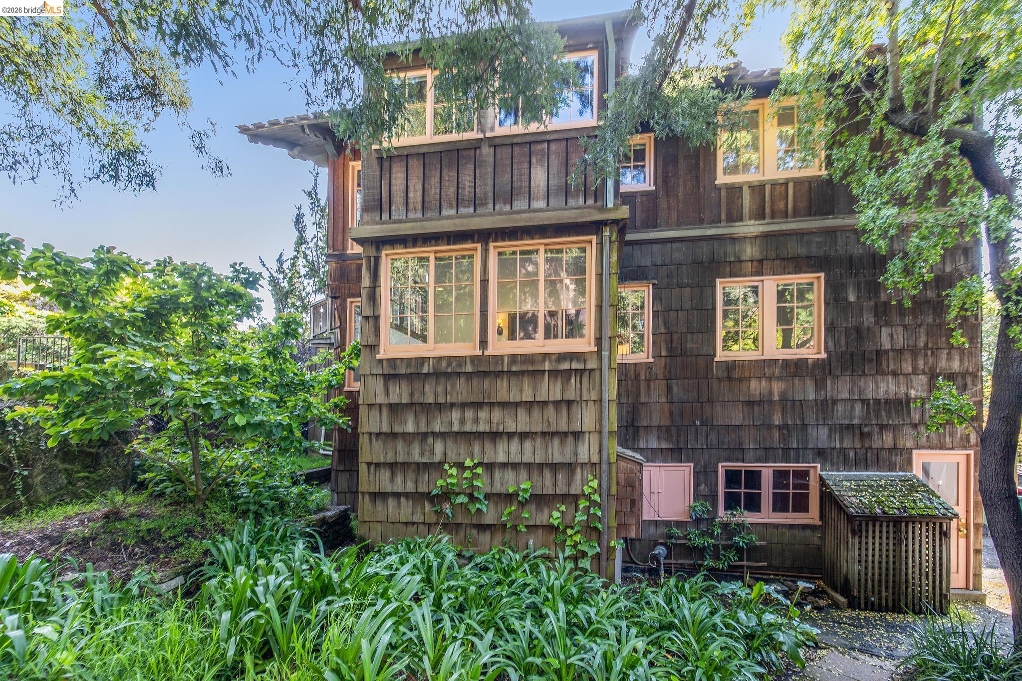 2501 Rose Walk Berkeley, CA 94708 - Photo 7 of 60 a front view of a house with a garden