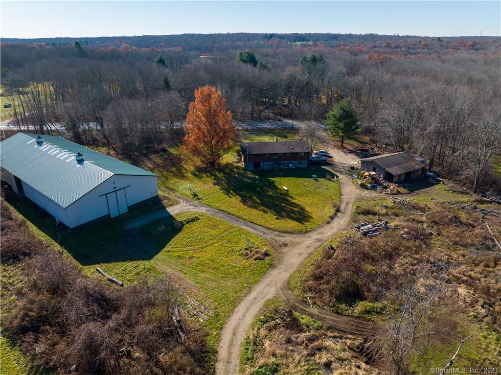 a view of a houses with a yard