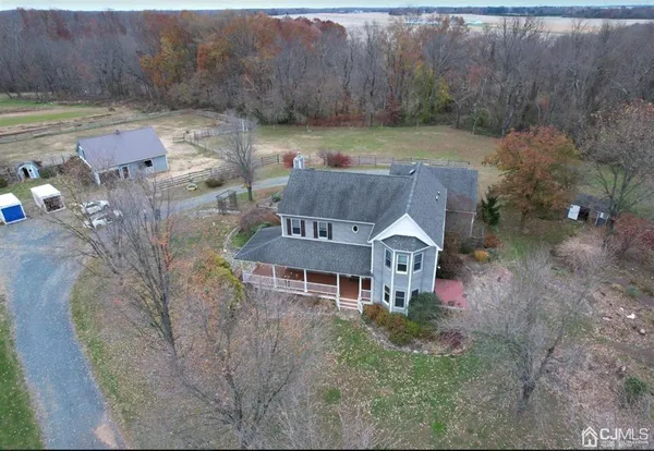 an aerial view of a house with garden