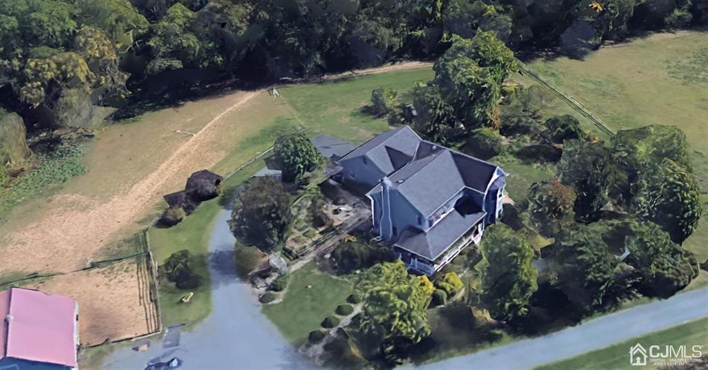 54 Cranbury Neck Road Cranbury, NJ 08512 - Photo 2 of 11 an aerial view of a house with garden space and street view