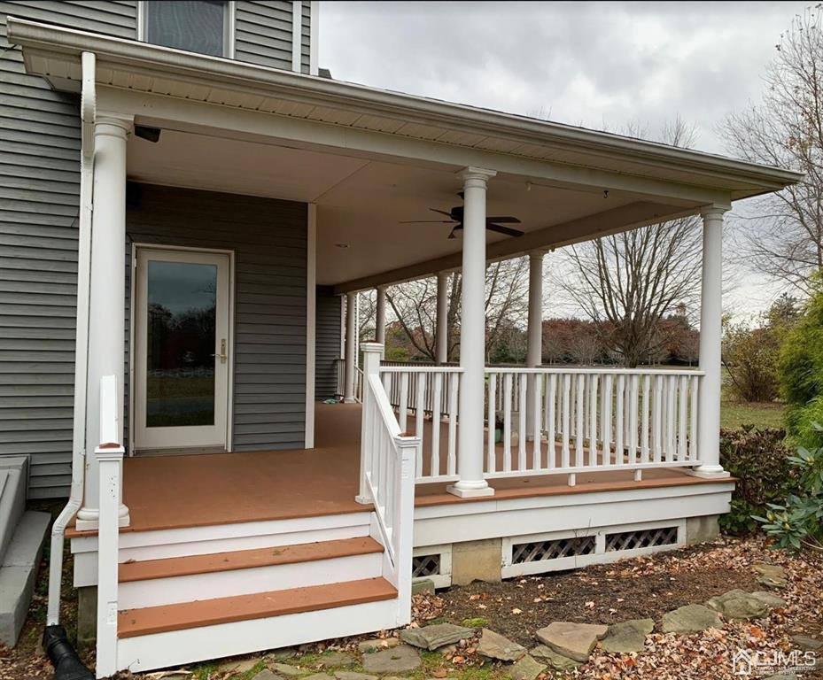 54 Cranbury Neck Road Cranbury, NJ 08512 - Photo 5 of 11 a view of a wooden deck
