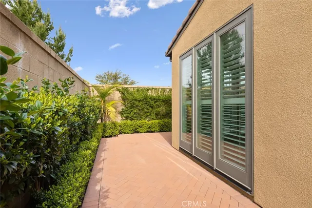 a view of a backyard with garden