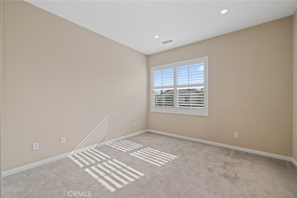 133 Waterleaf Irvine, CA 92620 - Photo 19 of 22 a view of an empty room with a window