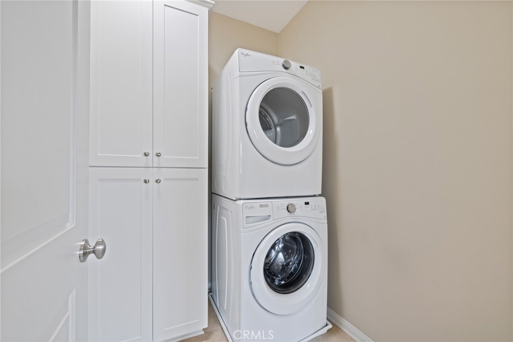 133 Waterleaf Irvine, CA 92620 - Photo 22 of 22 a utility room with dryer and washer