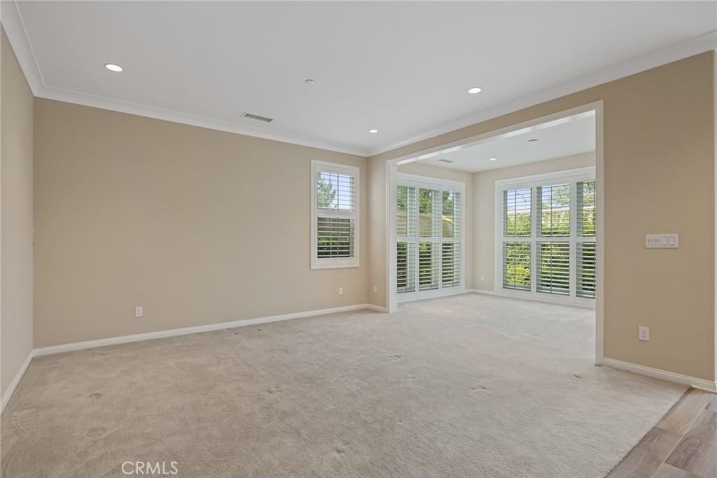 133 Waterleaf Irvine, CA 92620 - Photo 7 of 22 a view of an empty room with a window