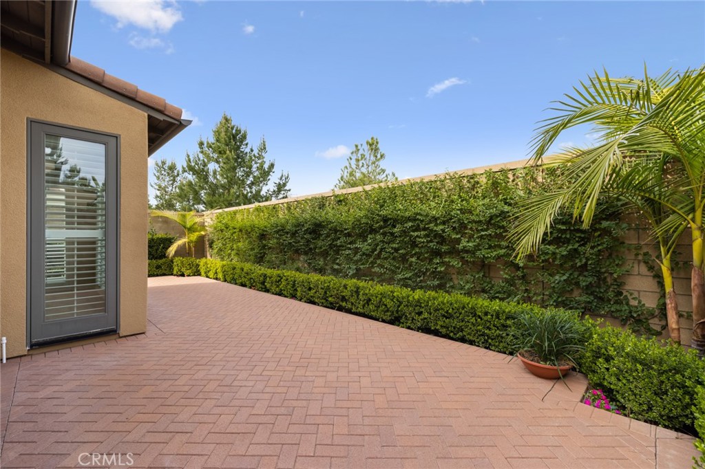 133 Waterleaf Irvine, CA 92620 - Photo 9 of 22 a view of a pathway both side of house