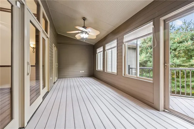 a view of gallery with wooden floor