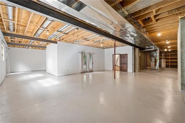 a view of a hallway with wooden floors