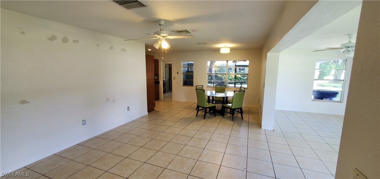 1422 Mandel Road Fort Myers, FL 33919 - Photo 17 of 39 a view of a livingroom with furniture and a window