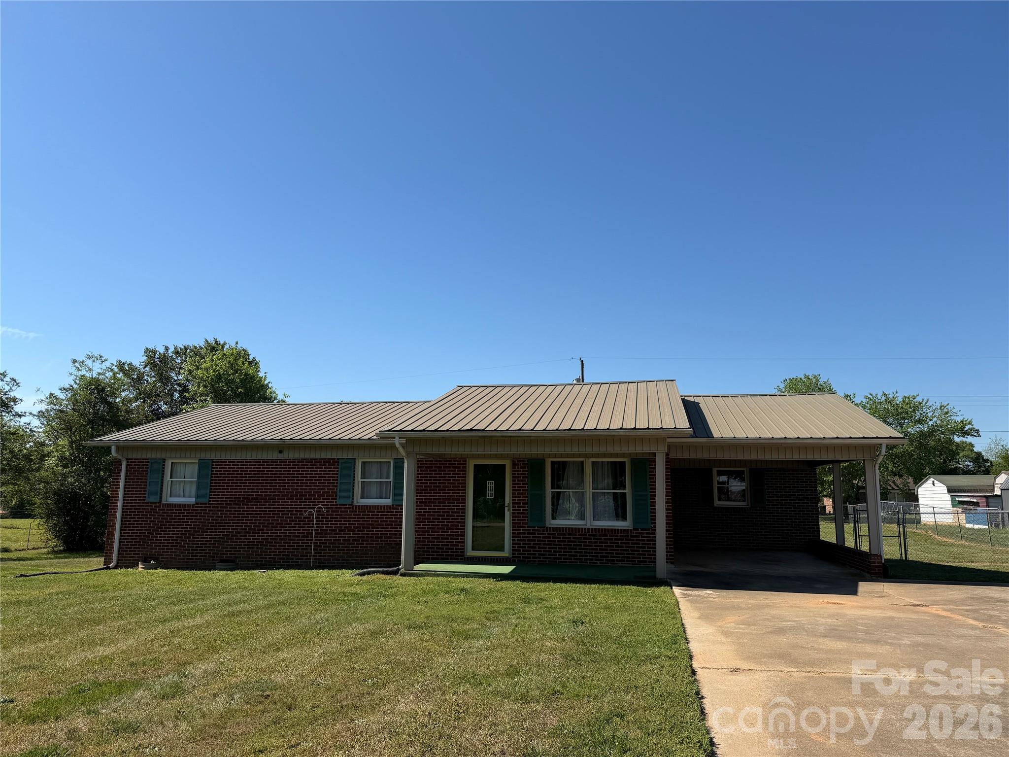372 Ferry Road Forest City, NC 28043 - Photo 22 of 36 a front view of a house with a yard