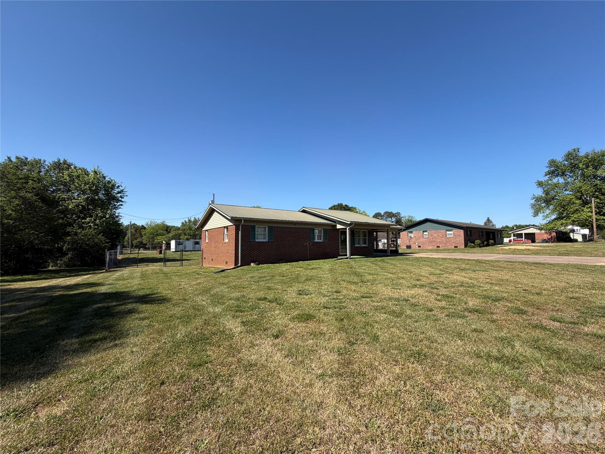372 Ferry Road Forest City, NC 28043 - Photo 23 of 36 a front view of a house with a yard