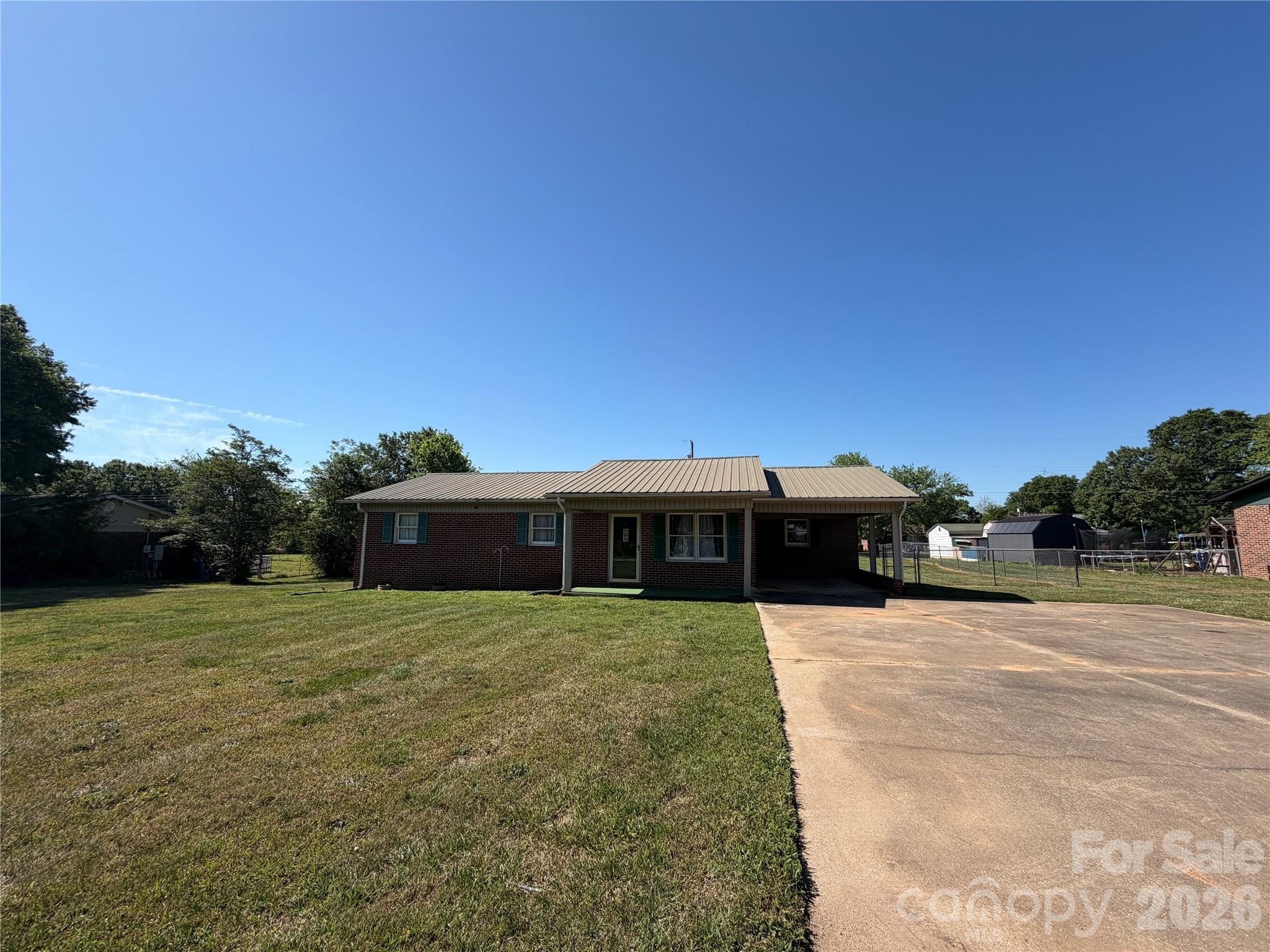 372 Ferry Road Forest City, NC 28043 - Photo 33 of 36 a view of a house with a yard