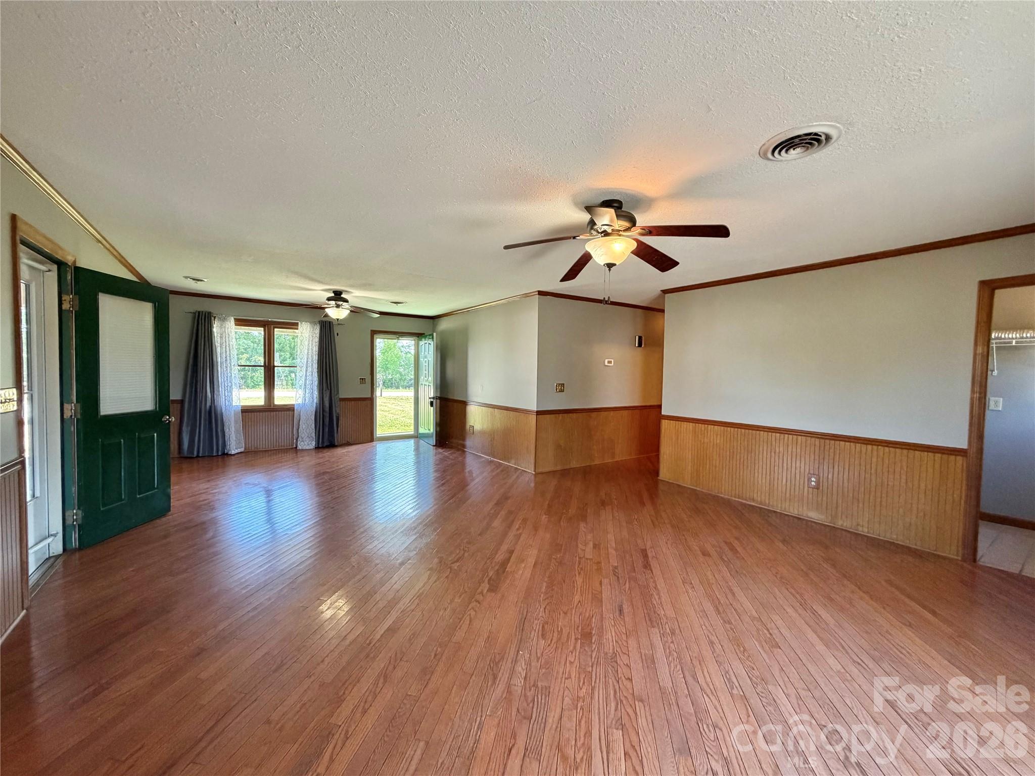 372 Ferry Road Forest City, NC 28043 - Photo 10 of 36 a view of empty room with wooden floor