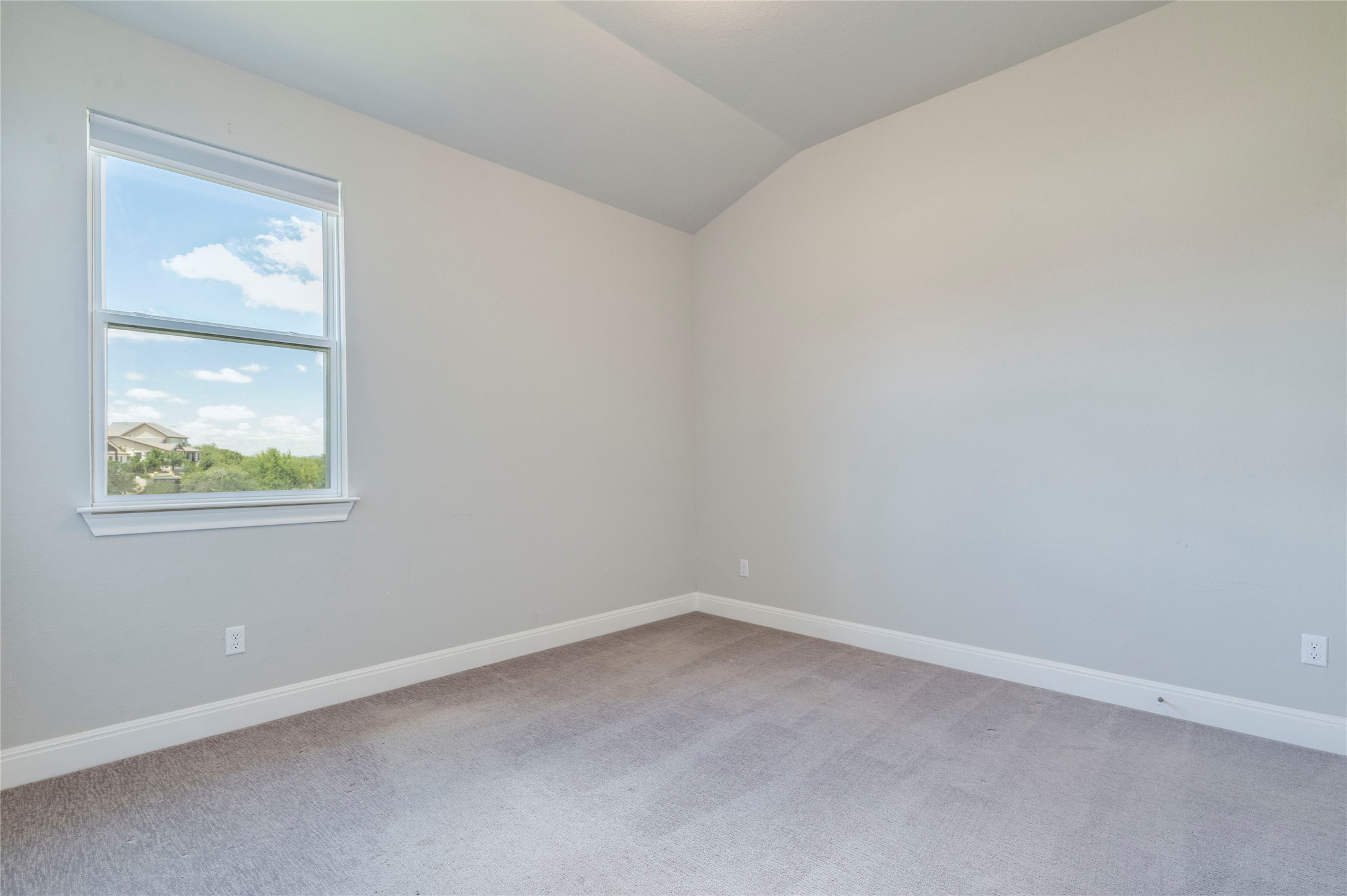 130 Sierra Blanca Road Dripping Springs, TX 78620 - Photo 20 of 24 an empty room with a window