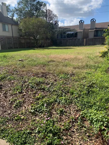 a view of outdoor space and yard