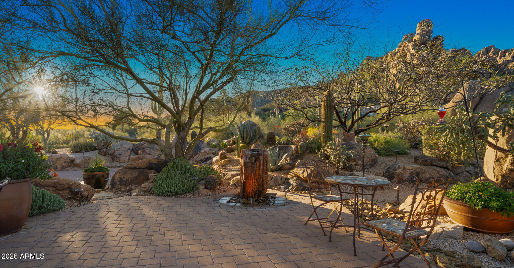 35035 Whileaway Road Carefree, AZ 85377 - Photo 14 of 64 a view of a chairs and table in the patio