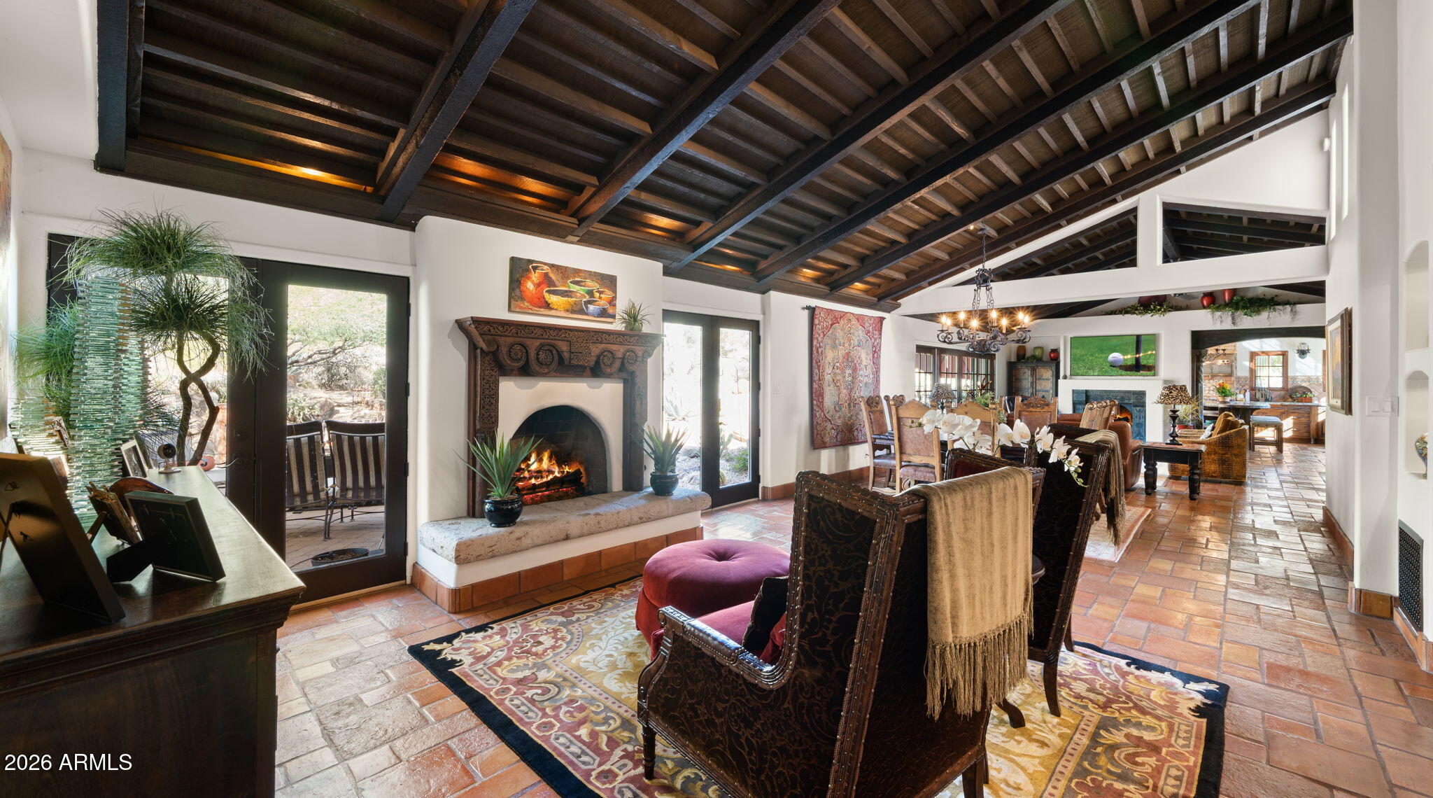 35035 Whileaway Road Carefree, AZ 85377 - Photo 19 of 64 a living room with fireplace furniture and a fireplace