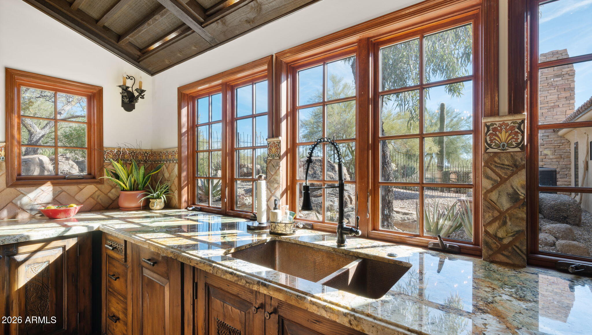 35035 Whileaway Road Carefree, AZ 85377 - Photo 24 of 64 a kitchen with a sink and a large window