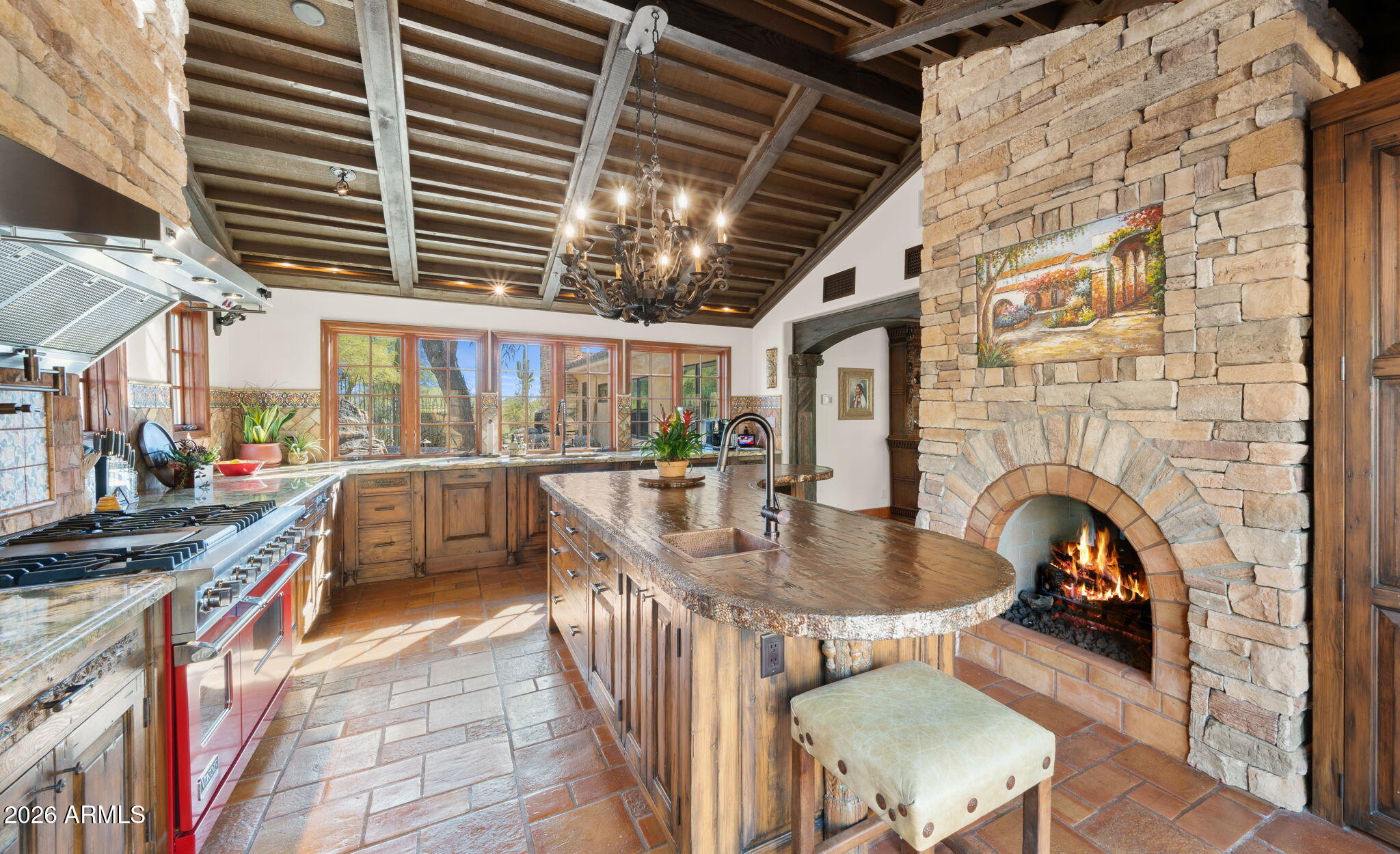 35035 Whileaway Road Carefree, AZ 85377 - Photo 27 of 64 a dining room with furniture and a fireplace