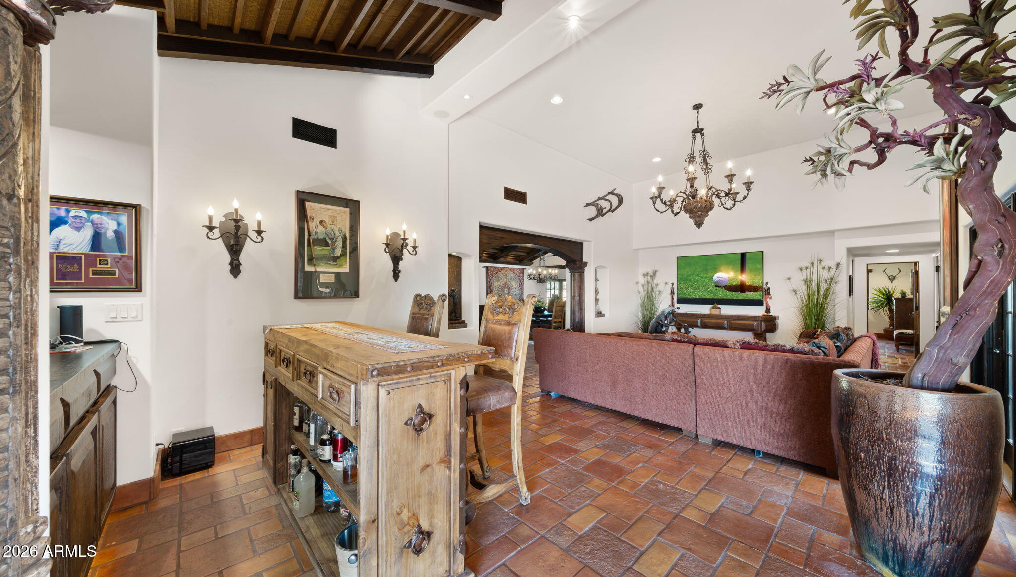 35035 Whileaway Road Carefree, AZ 85377 - Photo 31 of 64 a living room with furniture and a flat screen tv