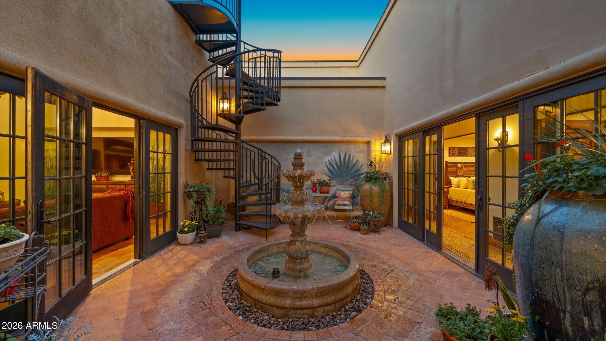 35035 Whileaway Road Carefree, AZ 85377 - Photo 36 of 64 a room with fireplace lots of furniture and a floor to ceiling window