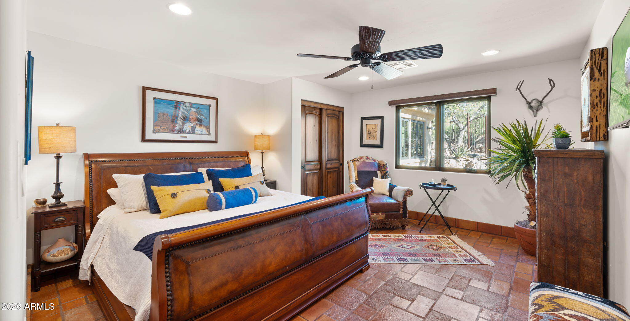 35035 Whileaway Road Carefree, AZ 85377 - Photo 43 of 64 a bed room with a bed and a couch