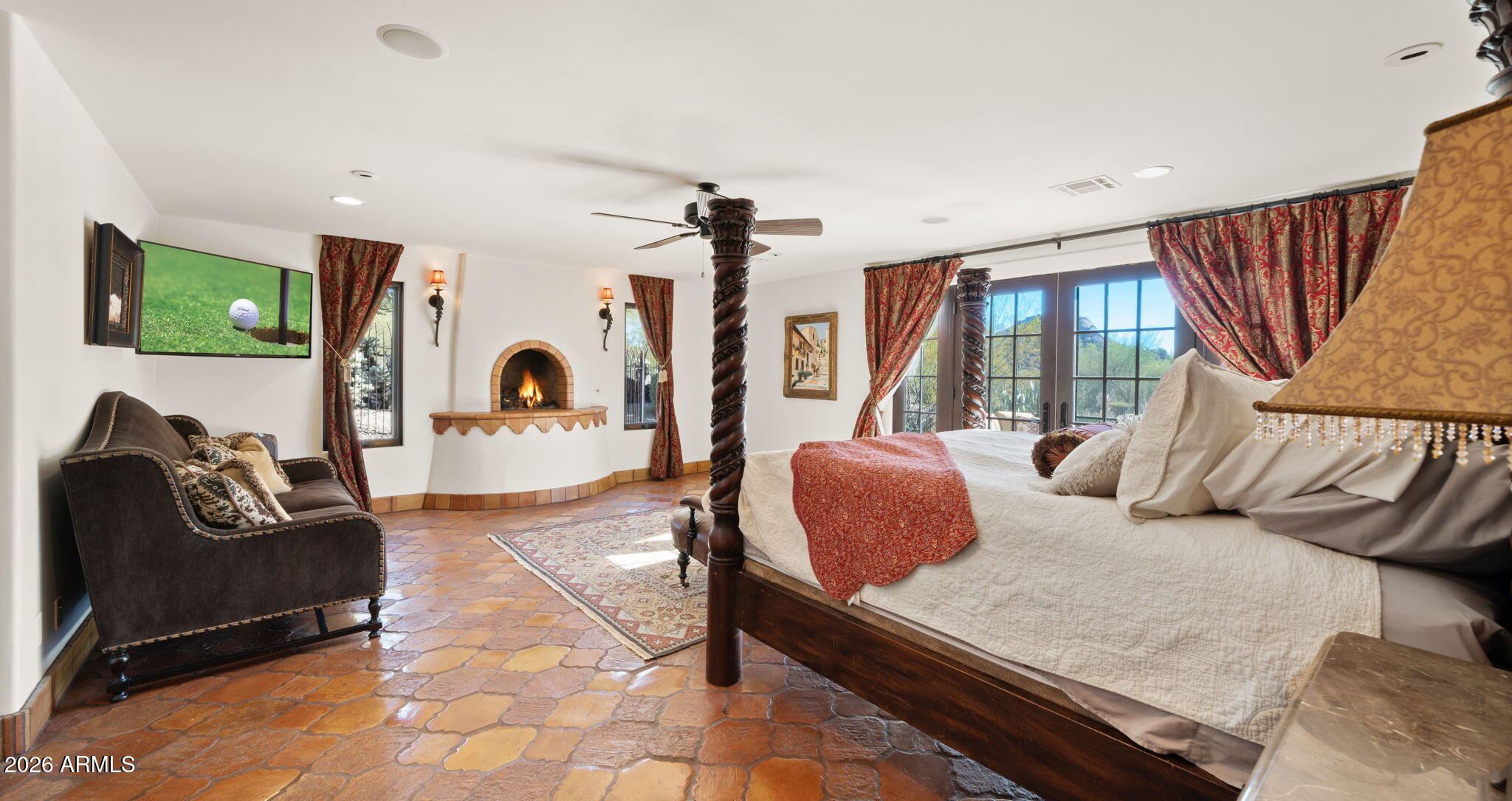 35035 Whileaway Road Carefree, AZ 85377 - Photo 45 of 64 a living room with furniture a flat screen tv and a large window