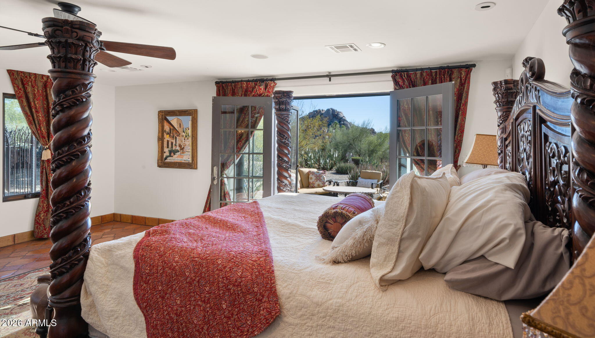 35035 Whileaway Road Carefree, AZ 85377 - Photo 46 of 64 a bedroom with a bed and a walk in closet