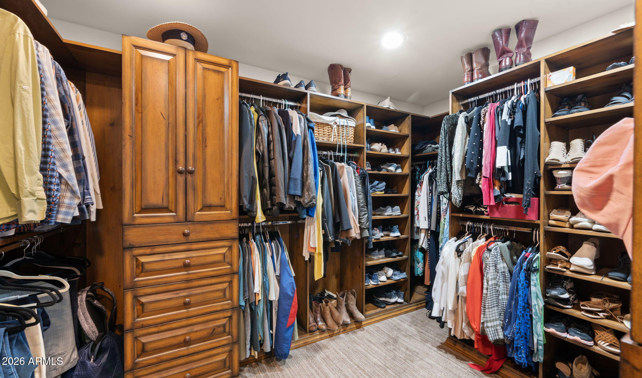 35035 Whileaway Road Carefree, AZ 85377 - Photo 52 of 64 a view of walk in closet with clothes