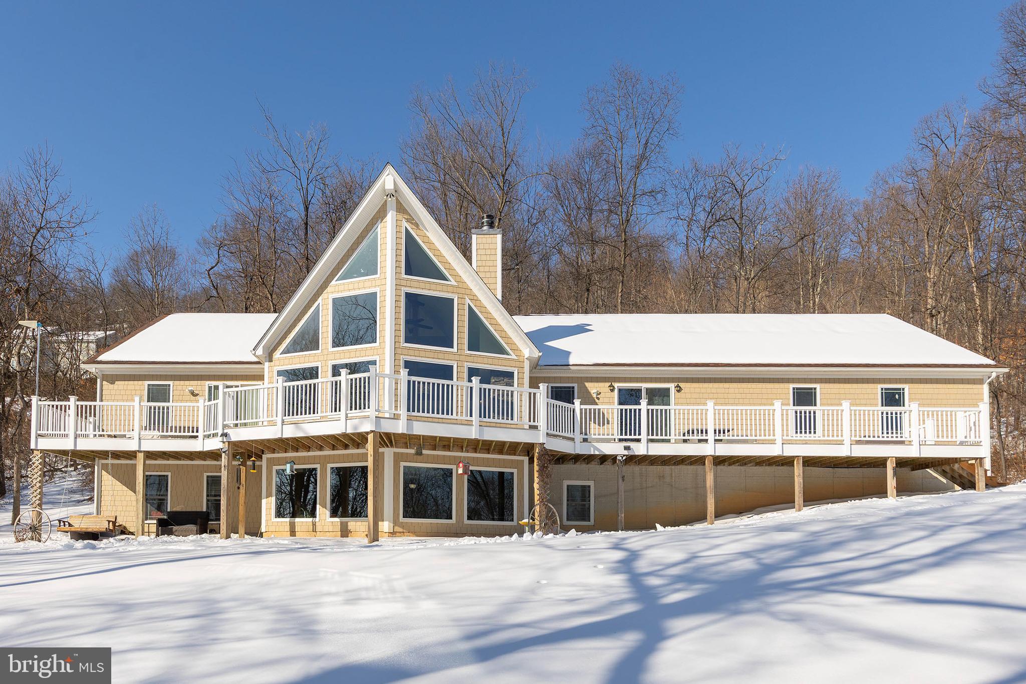 4 Bed/3.5 Bath Chalet nestled on 3.26 acres!