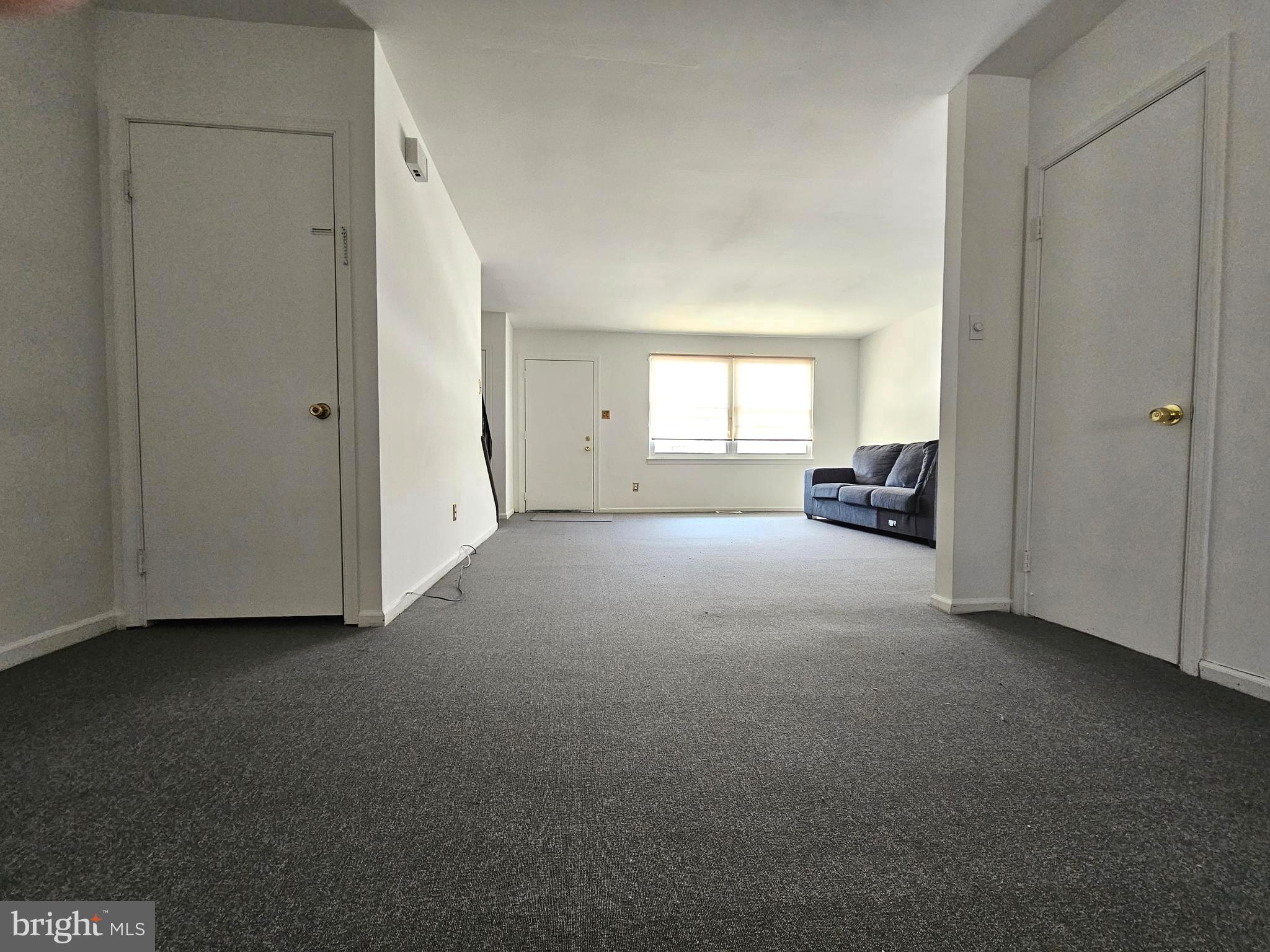 531 Pershing Avenue Darby, PA 19023 - Photo 13 of 33 a view of a livingroom and a empty room