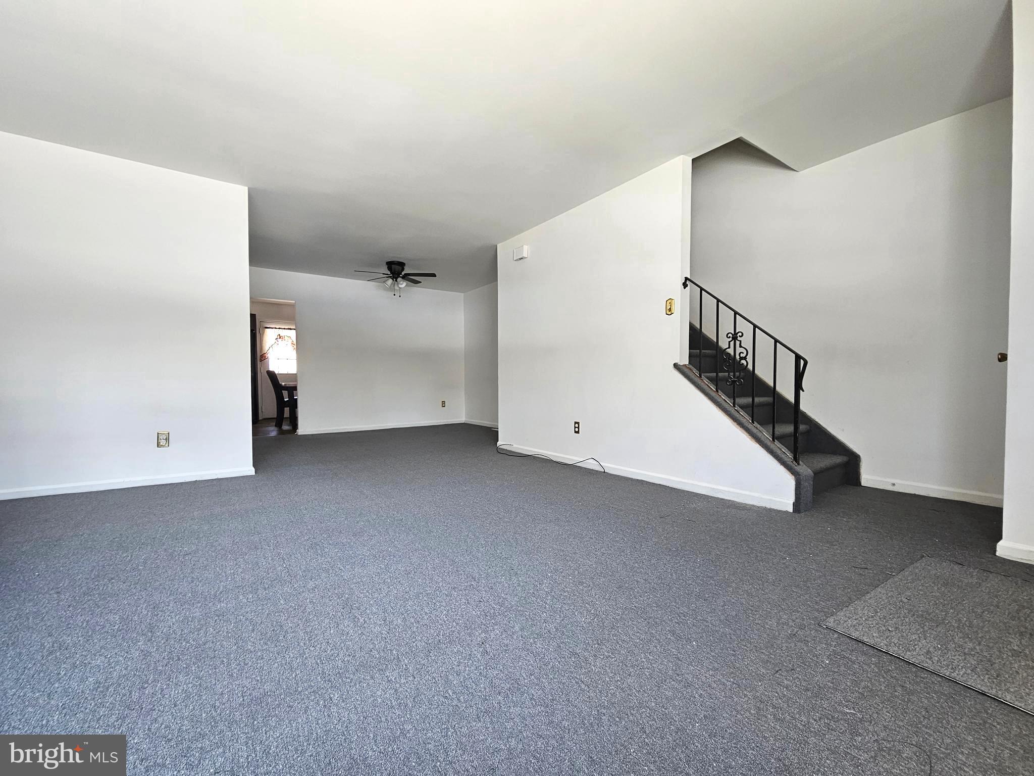 531 Pershing Avenue Darby, PA 19023 - Photo 17 of 33 a view of an empty room with stairs