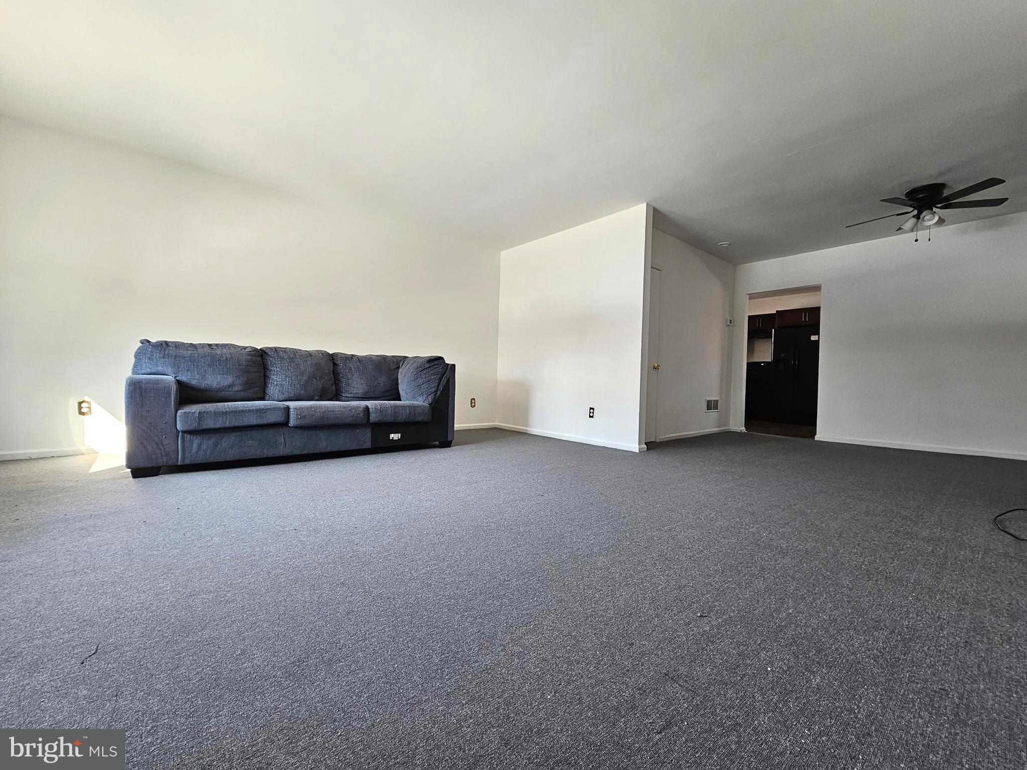 531 Pershing Avenue Darby, PA 19023 - Photo 18 of 33 a living room with a couch and a dresser