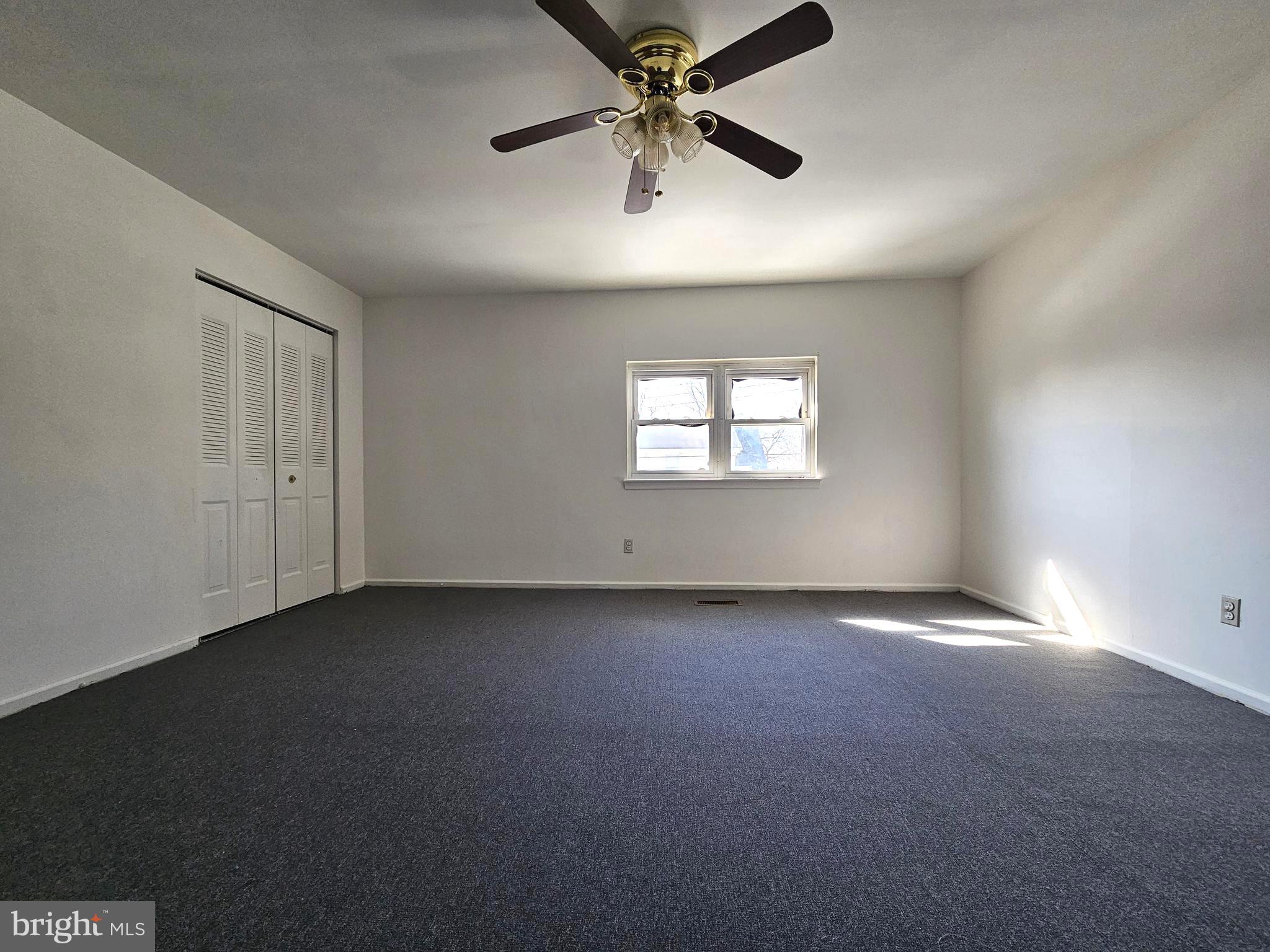 531 Pershing Avenue Darby, PA 19023 - Photo 22 of 33 an empty room with windows and fan