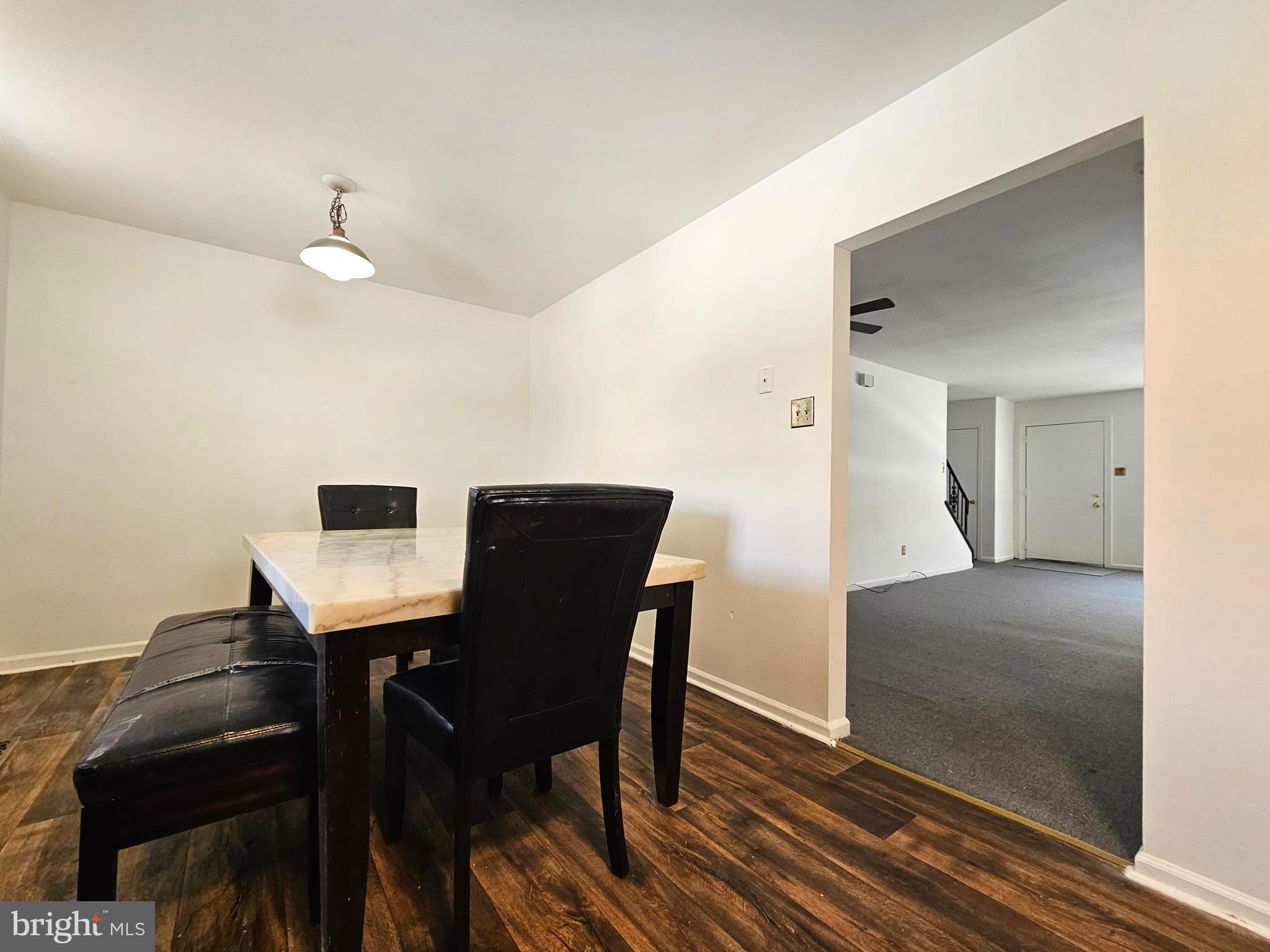 531 Pershing Avenue Darby, PA 19023 - Photo 9 of 33 a view of a dining room with furniture and wooden floor