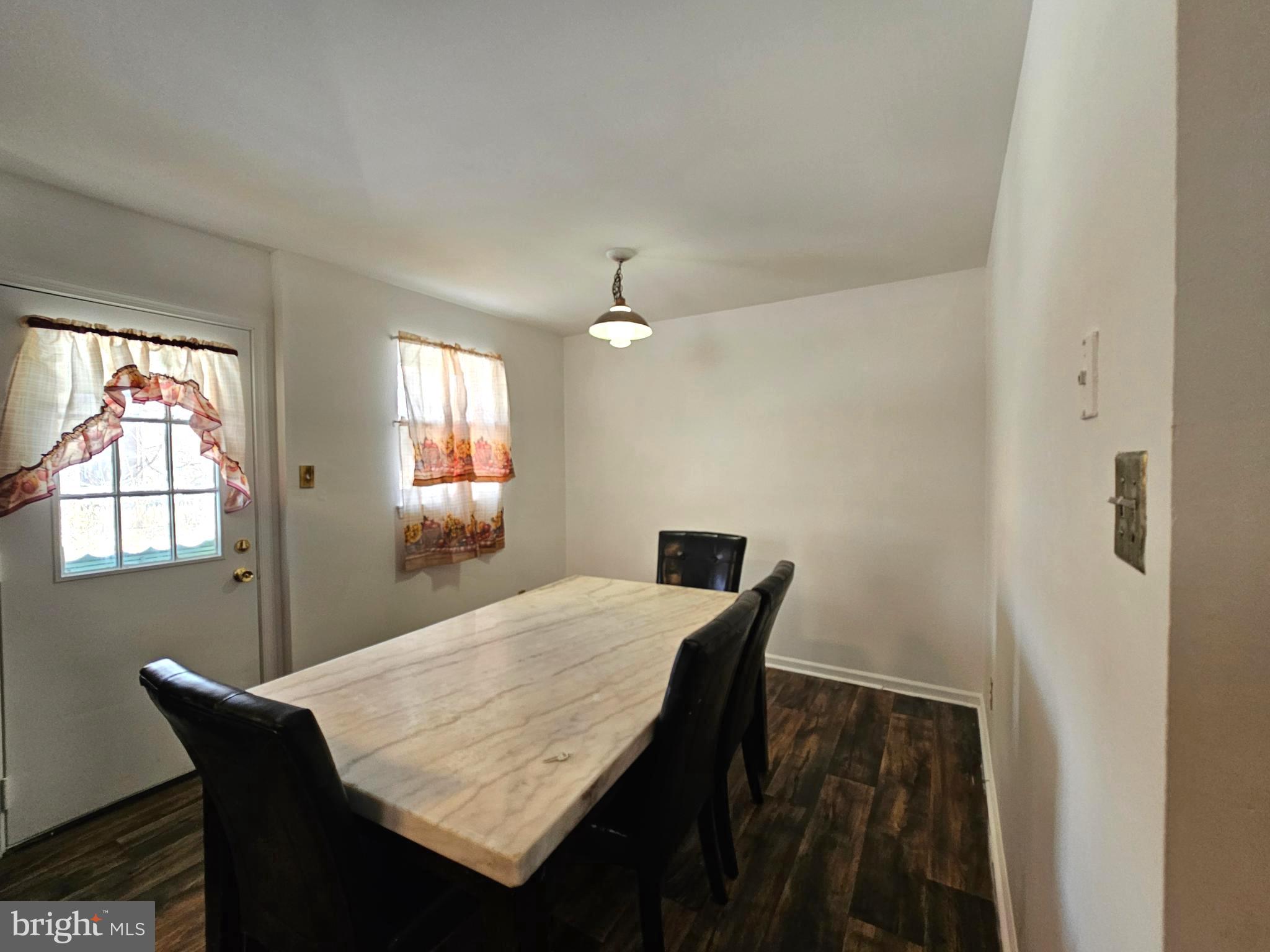 531 Pershing Avenue Darby, PA 19023 - Photo 10 of 33 a dining room with furniture and window