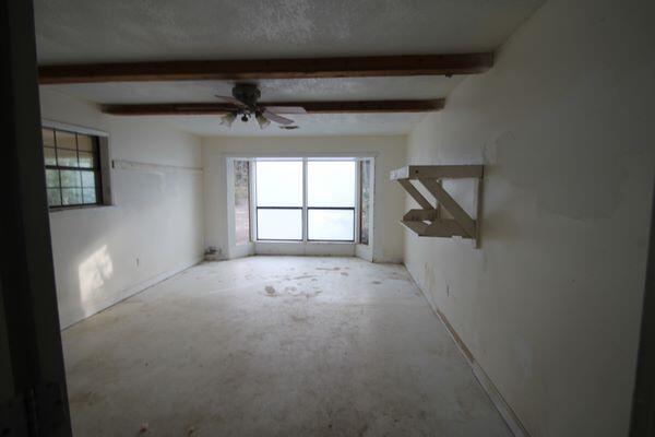 6047 Eden Square Crestview, FL 32539 - Photo 17 of 39 a view of empty room with windows