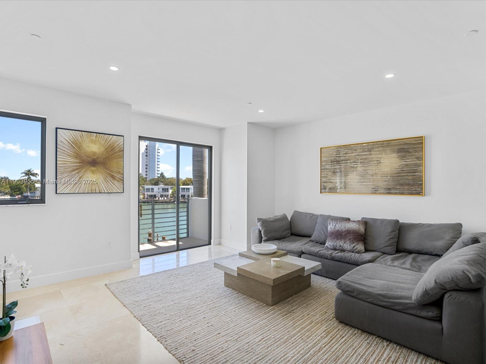 155 North Shore Drive, Unit 1553 Miami Beach, FL 33141 - Photo 17 of 48 a living room with furniture and a window