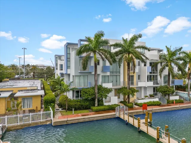 a house with palm tree in front of it