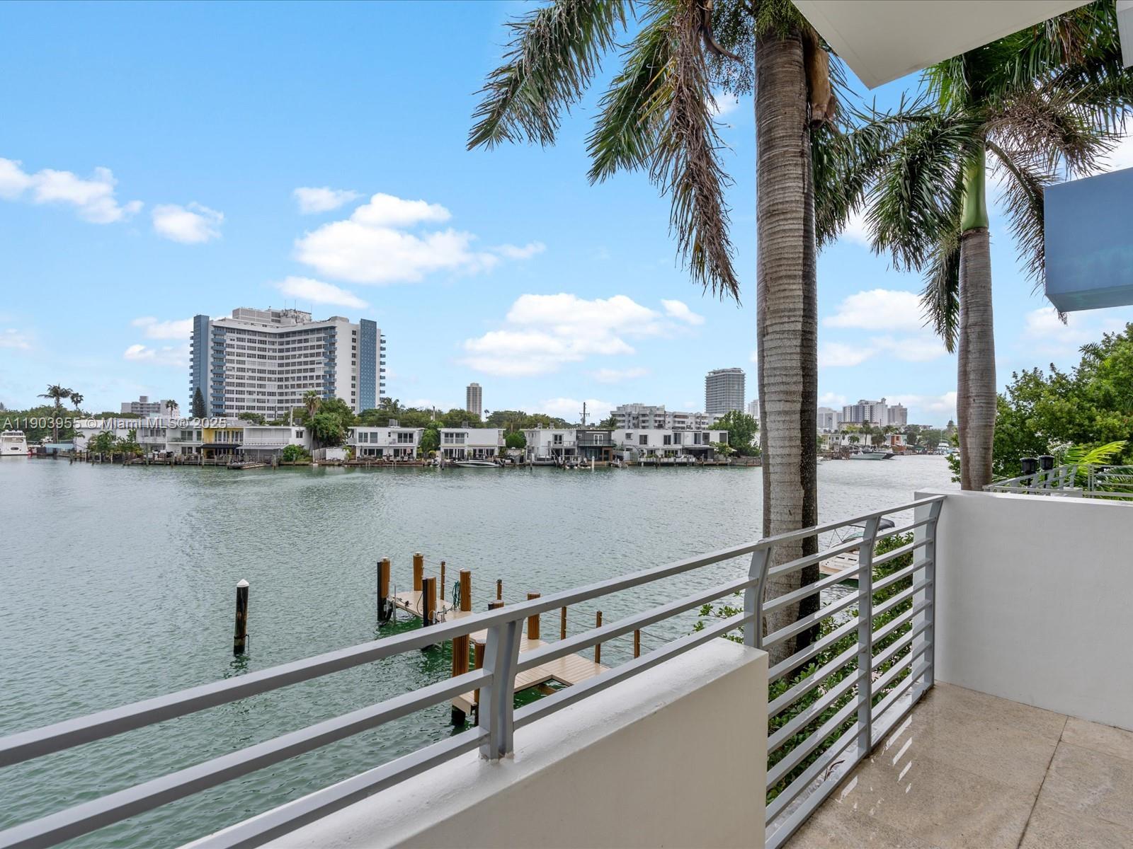 155 North Shore Drive, Unit 1553 Miami Beach, FL 33141 - Photo 46 of 48 a view of a lake and a balcony