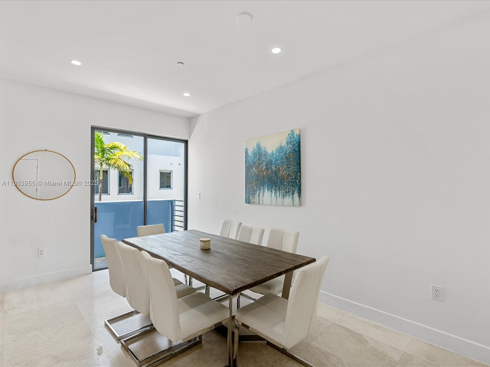 155 North Shore Drive, Unit 1553 Miami Beach, FL 33141 - Photo 7 of 48 a view of a dining room with furniture