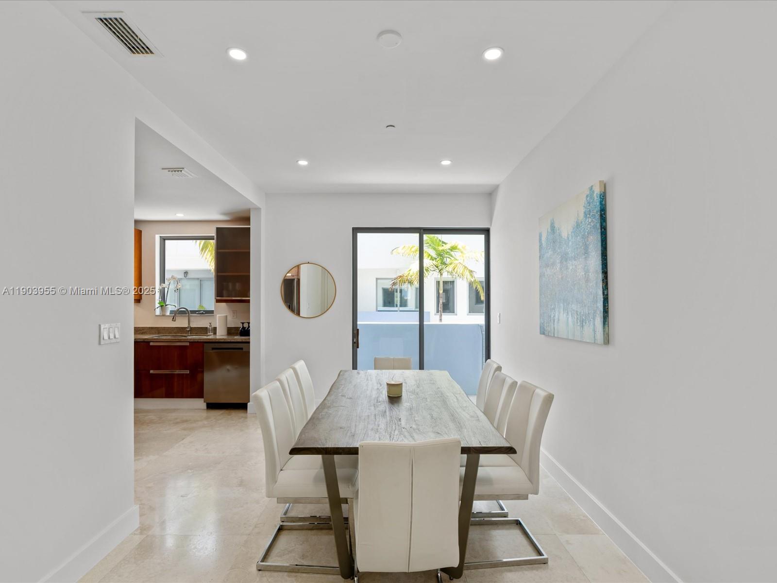 155 North Shore Drive, Unit 1553 Miami Beach, FL 33141 - Photo 8 of 48 a living room with furniture and a wooden floor