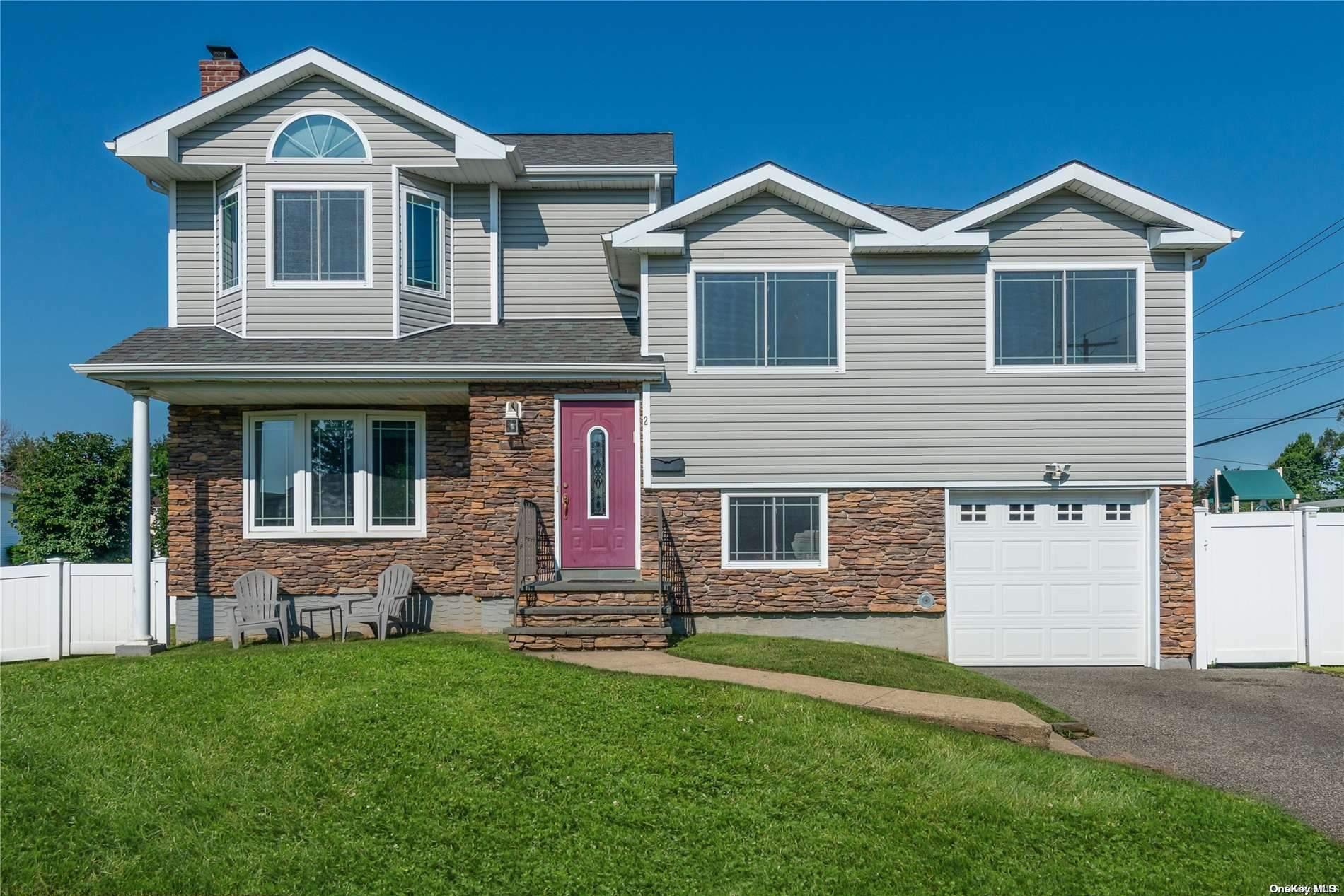 2 Highfield Road Syosset, NY 11791 - Photo 1 of 1 a front view of a house with a yard
