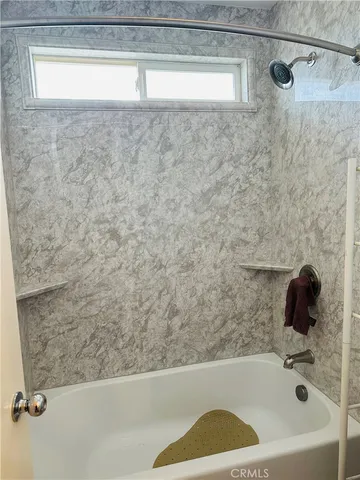 a bathroom with a bathtub