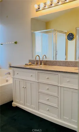 a bathroom with a sink and a bathtub