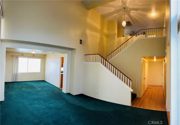 a view of hallway with stairs